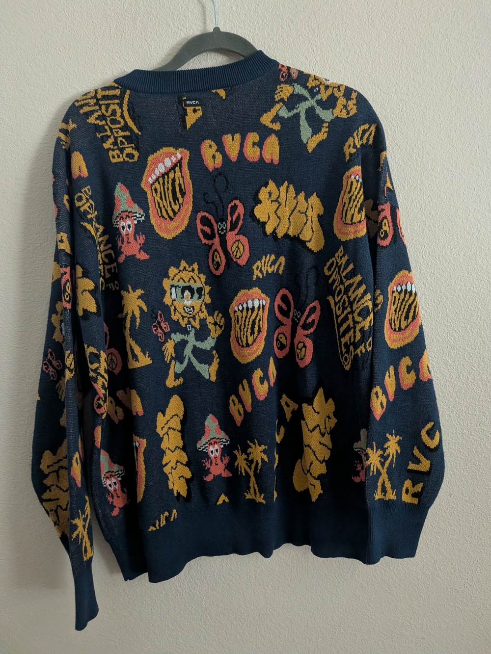 RVCA Navy Crewneck Sweater with Yellow & Coral Graphic Motifs - Picture 2 of 3